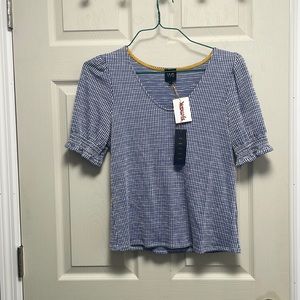 White and blue striped shirt